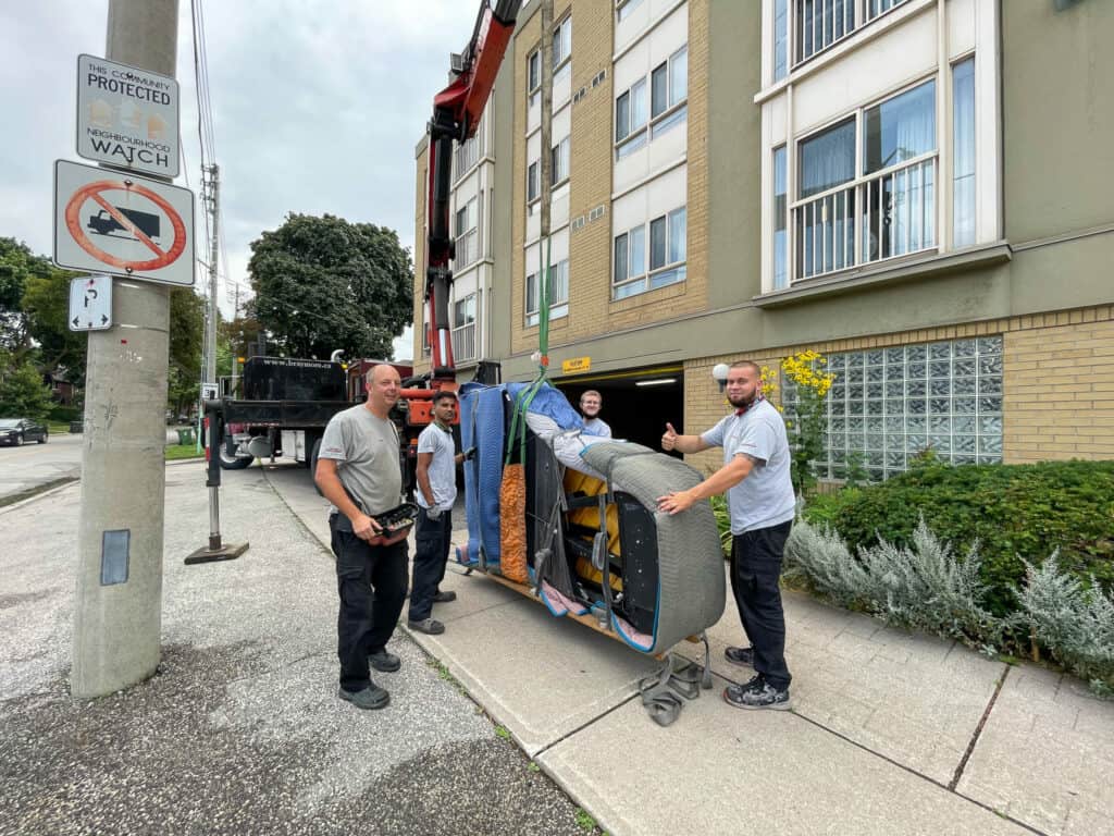 Craning a Yamaha 7' Concert grand piano into a balcony that would not fit in an elevator