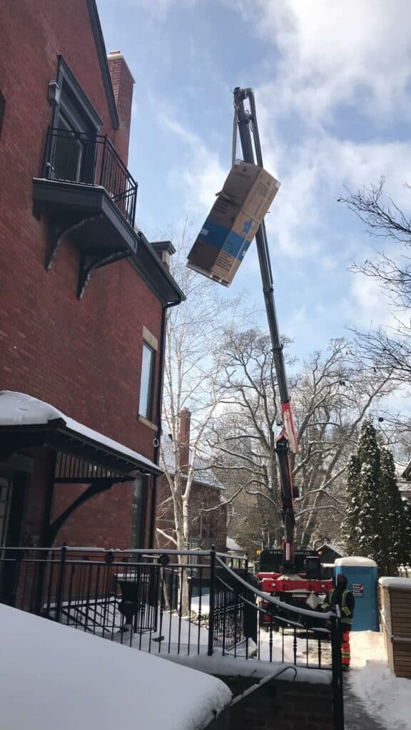 Craning Appliances through Juliet balcony at the side of home